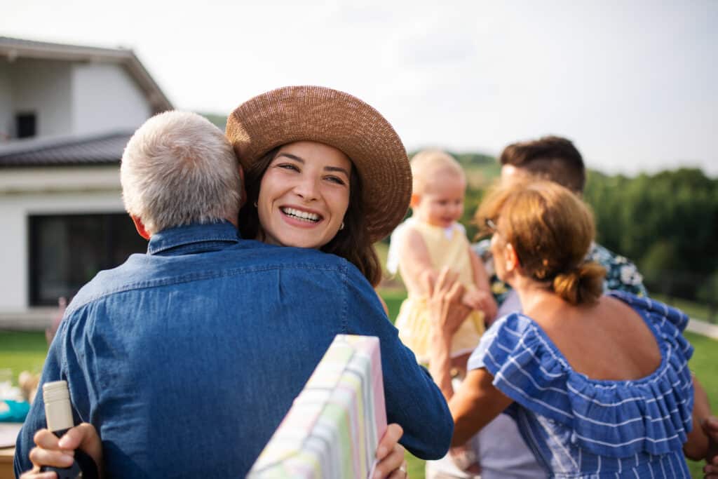 Portrait of happy people outdoors on family birthday party